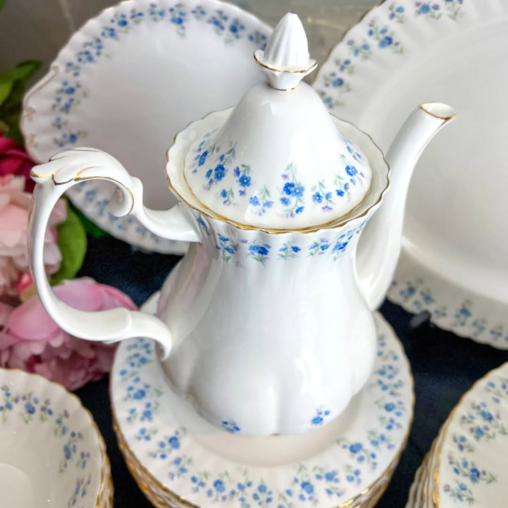his absolutely gorgeous place setting for 12 of Royal Albert Memory lane is a one of a kind purchase will amaze you with it's quality and beauty for your holiday dinner. Use for any celebration for years to come.