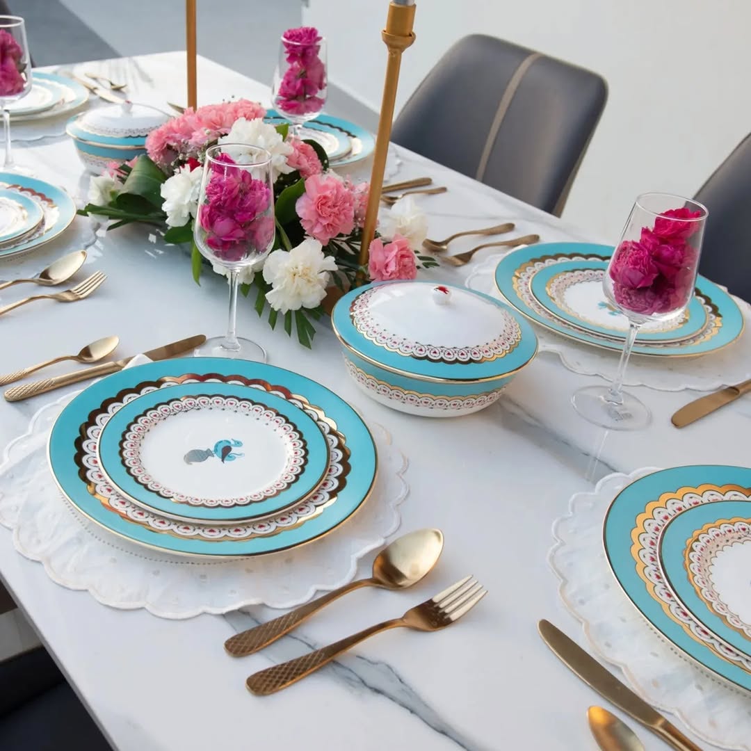 12 Dinner Plates, 12 Side Plates, 12 Dip Bowls, and 2 Serving Bowls