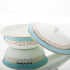 12 Dinner Plates, 12 Side Plates, 12 Dip Bowls, and 2 Serving Bowls