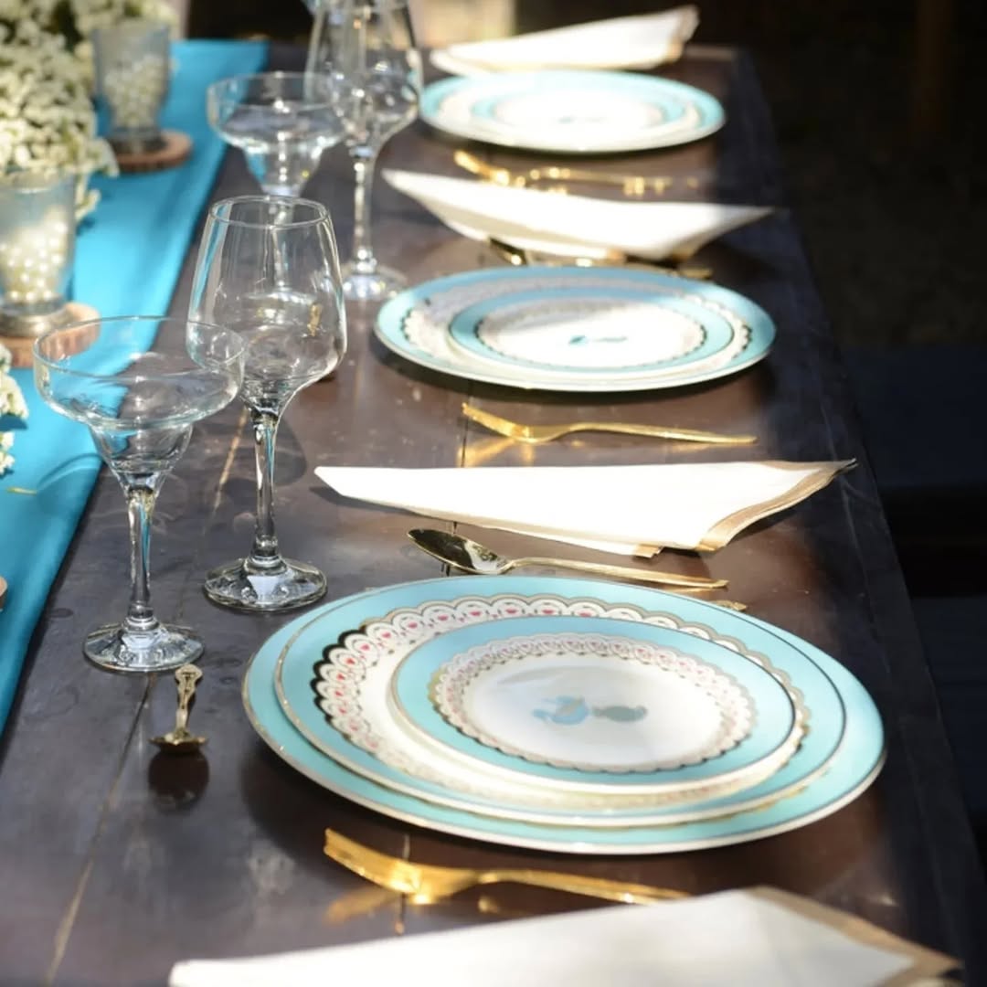 12 Dinner Plates, 12 Side Plates, 12 Dip Bowls, and 2 Serving Bowls